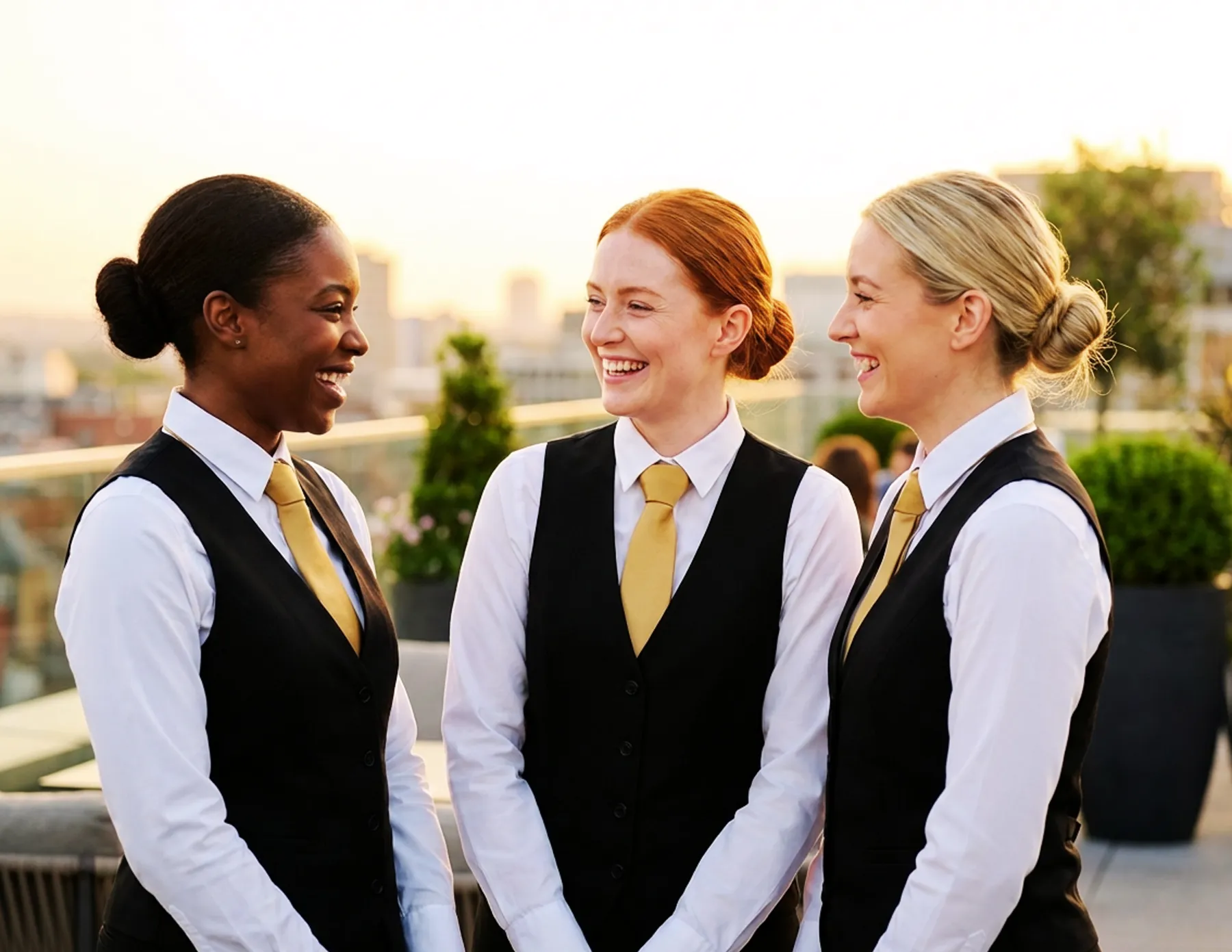 HMG+ outsourced hospitality staffing team getting ready to cater at an event.