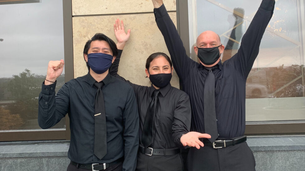 Hospitality staff celebrating a successful event